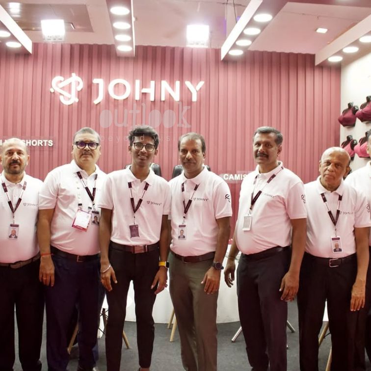 JOHNY corporate team group at branded exhibition stall in Bangalore