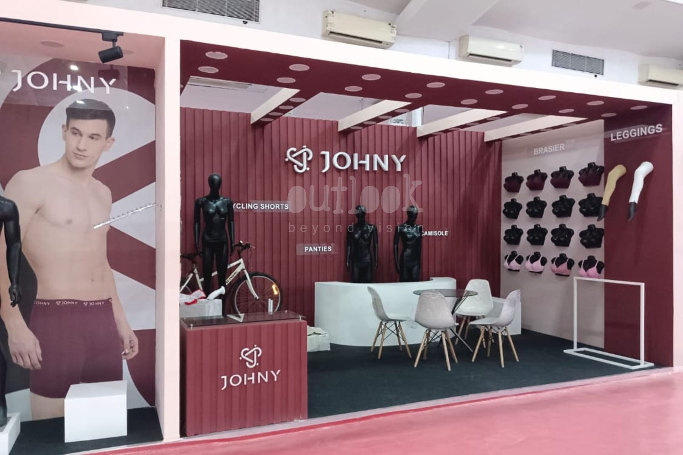 JOHNY branded exhibition booth with cycling shorts and men’s mannequins in Bangalore event